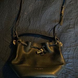 Authentic Marc jacobs leather bucket bag black with gold trim.